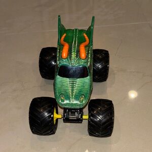 Monster Jam Dino-Themed Green and Orange Monster Truck